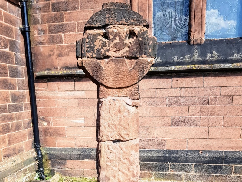 The reconstructed cross.  St Barnabas   church. Bromborough.